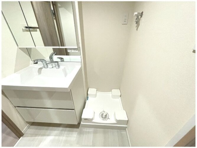 洗面台に洗濯スペースを採用。効率よく家事ができる導線が嬉しいですね。