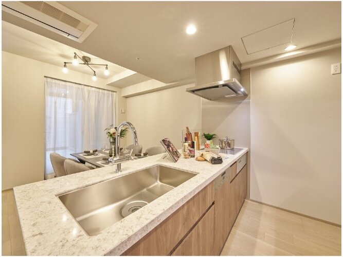 無駄なく作業でき、お手入れラクラクなカウンターキッチンで食事の準備や片付けをやり易く、そして楽しく。